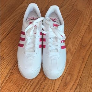 Pink and white adidas
